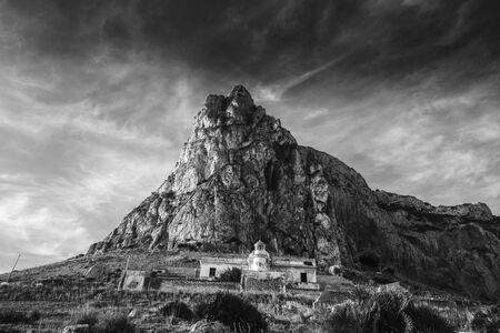 Sunrise over the Coast of Sicily. Dawn at Capo Gallo Coast near Palermo at Mondello on a warm autumn morning. Lovely sun and waves in the seaの写真素材