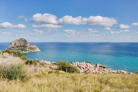 Sunrise at the Coast of Sicily. Dramatic Atmosphere with strong waves and clouds at Santa Flavia near Palermo, Italy in Europe in Autumn, Octoberの写真素材