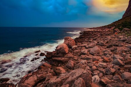 Coastal Landscape of Sicily in the Morning. Cloudy sky and waves at the seaの写真素材