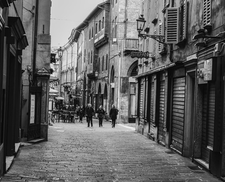 BOLOGNA, ITALY - NOVEMBER 27 2015: Black and White Scene from the town center of Bologna on a cold November Dayのeditorial素材