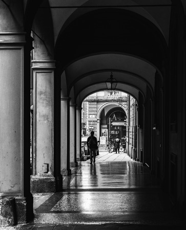 BOLOGNA, ITALY - NOVEMBER 27 2015: Black and White Scene from the town center of Bologna on a cold November Dayのeditorial素材