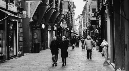 BOLOGNA, ITALY - NOVEMBER 27 2015: Black and White Scene from the town center of Bologna on a cold November Dayのeditorial素材
