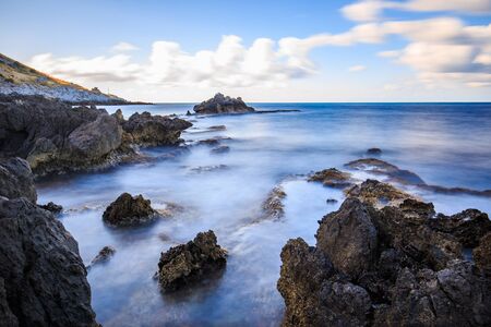 Coastline Landscape in Italy. Mediterranean Sea on Sicily in High Summer with lovely clouds and deep...