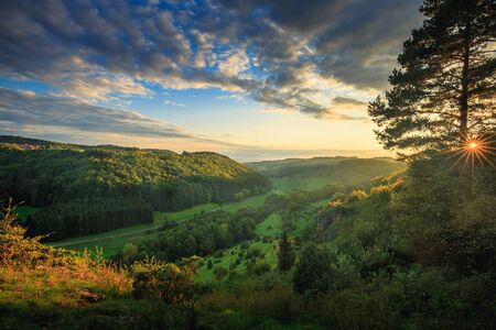 Picturesque Bavarian Autumn Hill Countryside Landscape in September Germany at Sunset. Frankenalb in Upper Franconiaの写真素材