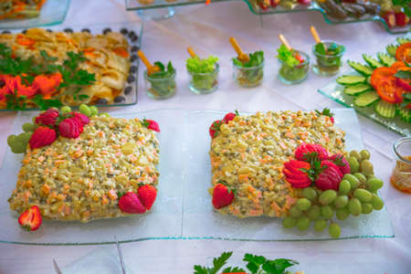 buffet, salads are on the table.の写真素材