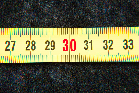 A piece of metric numbering system and can conceptualize the age or weight or simply measure to conceptの写真素材