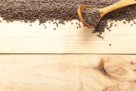 Lentils seen from above pouch of jute naturally illuminated with lightの写真素材