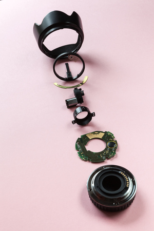 Components of a camera lens sorted and viewed from aboveの写真素材