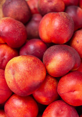 Close Up Group Of Peaches In The market. rape Fruit. Fresh Peach From Garden.の写真素材