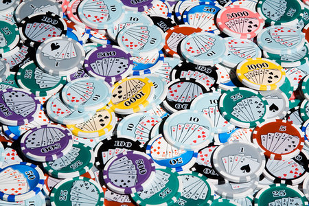 A large number of poker chips across the entire field of view