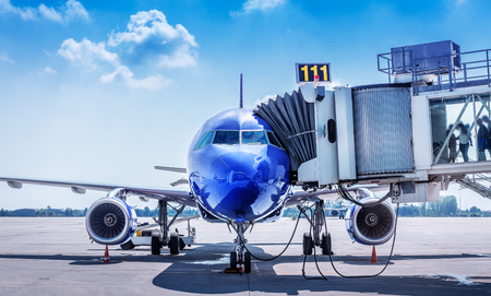 aircraft gets prepared for take offの写真素材