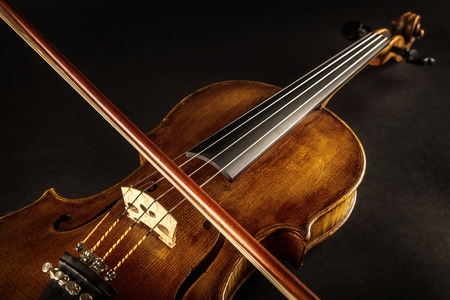 Close up of a baroque violin and bowの写真素材