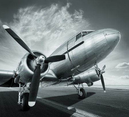 historical airplane on a runwayの写真素材