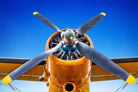 Propeller of a historic airplane against a blue skyの写真素材