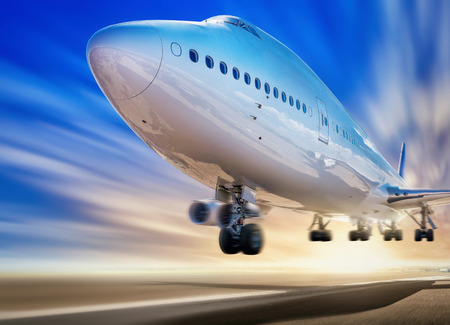Take off of a modern airliner from a runwayの写真素材