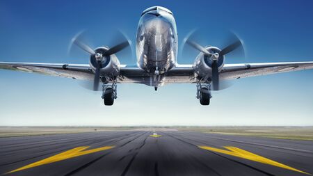 Historical aircraft while take offの写真素材