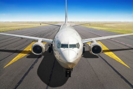 Modern airliner on a runway ready for take off