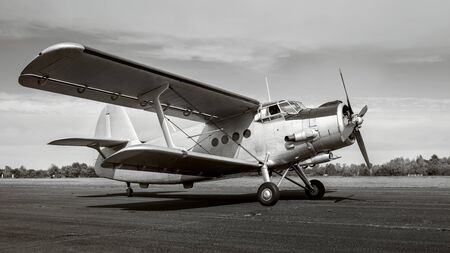 Historical aircraft on a runway ready for take offの写真素材