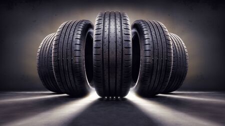 Close up of five wheels against blackの写真素材