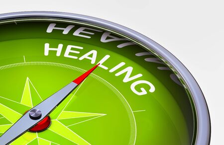 3D rendering of an compass with the word healingの写真素材