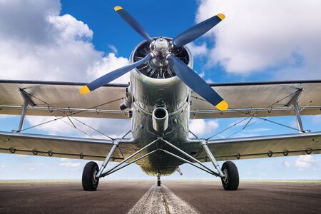 Historical aircraft on a runwayの写真素材