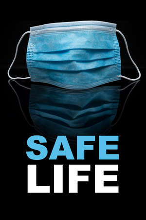 Protective face mask on blackの写真素材