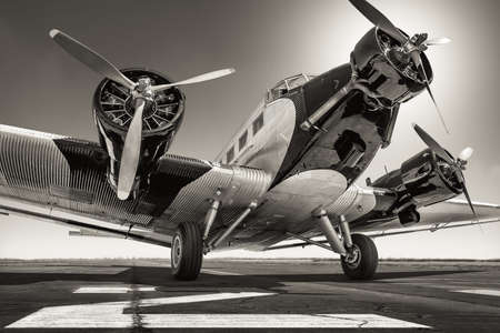 historical plane on a runwayの写真素材