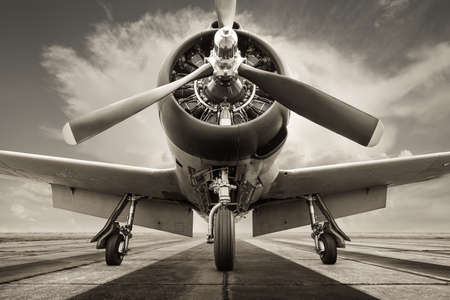 historical aircraft on a runway ready for take offの写真素材