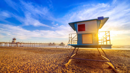 rescue tower at huntington beach during sunsetの写真素材