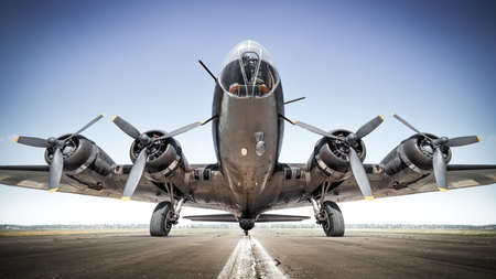 historical aircraft on a runwayの写真素材