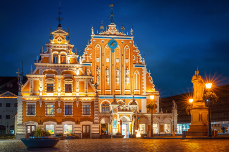 the famous houses of the blackheads in riga at nightの写真素材