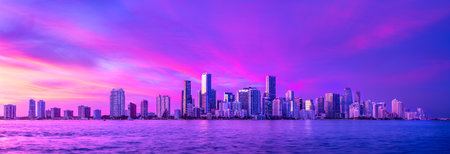 the skyline of miami during a beautiful sunsetの写真素材