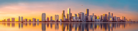 the skyline of miami during a beautiful sunsetの写真素材