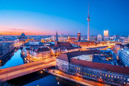 the skyline of berlin during sunsetのeditorial素材