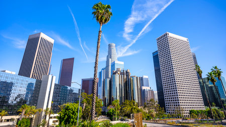 the skyline of los angeles under a blue skyの写真素材