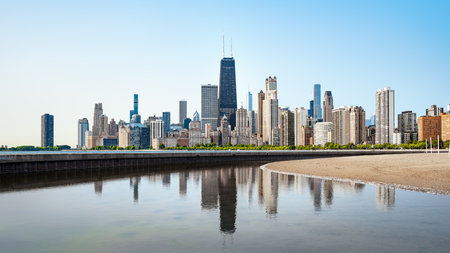 The reflected skyline of Chicago in the early morning lightの写真素材