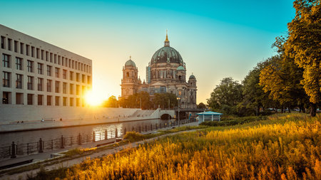 the famous berlin cathedral during sunsetの写真素材