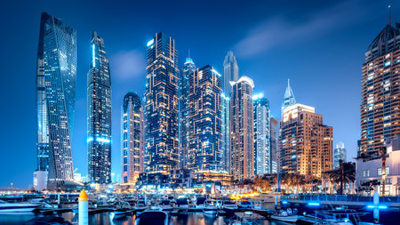 the skyline of the dubai marina at nightの写真素材