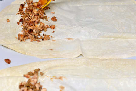 Chef prepares shaurma doner, concept restaurant fast foodの写真素材