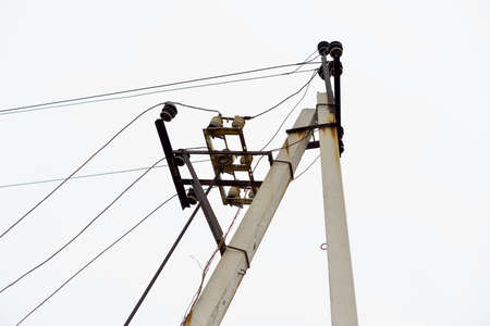 Chaos of cables and wires on electric pole, Messy wires attached to electrics pole in Bangkok,...