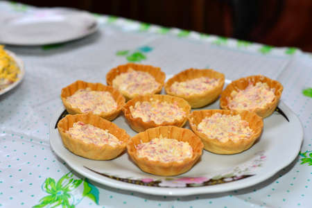 two sandwich pickles on a paper towel on wooden background in rustic style. the view from the topの写真素材