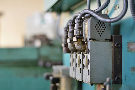 Technicians are turning lathe with horizontal lathe machine.