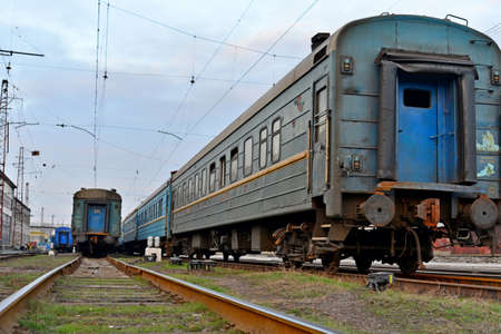Passenger and freight train. Passenger diesel train traveling speed railway wagons journey light
