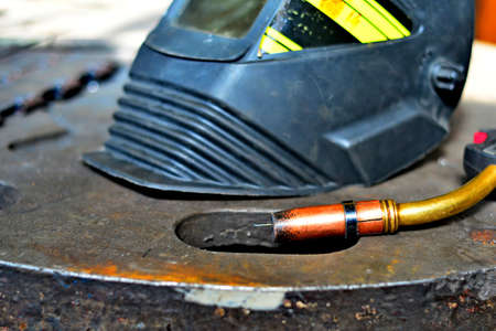Industrial steel welder in factory