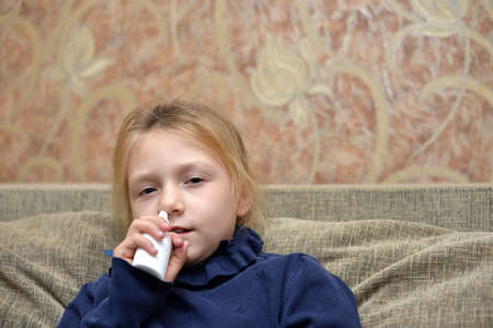 Close-up thermometer measuring temperature with pills on the backgroundの写真素材