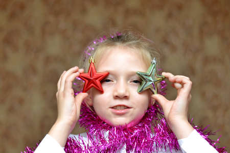 Funny children keep buhirb for Christmas and New Yearの写真素材