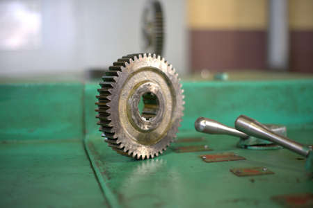 Gear gear from the assembly mechanism at the production plant in disassembled form close-up.の写真素材