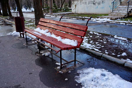 Red shop in the snow in the park.の写真素材