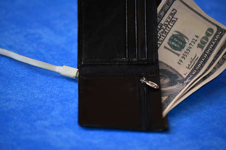 Black purse charged from the network on a red background