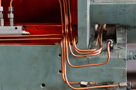 Hydraulics oil station on the machine tool on industrial equipment. Lubrication system with oil under pressure.の写真素材